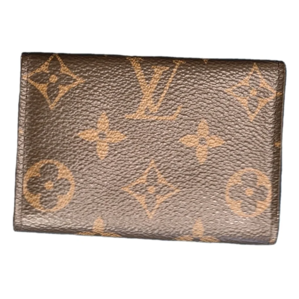 Louis Vuitton Leather Monogram Key Holder w Red interior (EXCELLENT CONDITION)